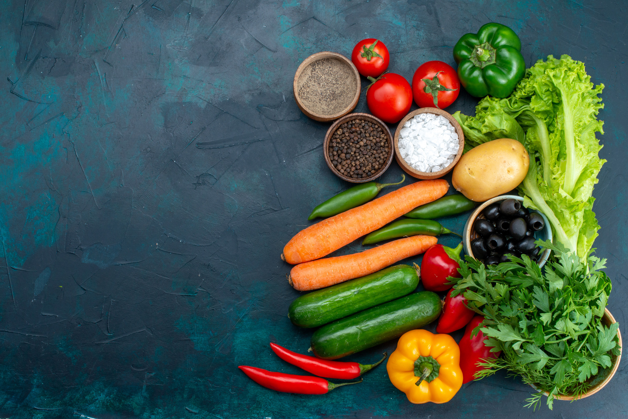 top-view-fresh-vegetables-with-greens-dark-blue-background-salad-snack-vegetable-food
