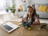 adorable-girl-being-passionate-about-robotics