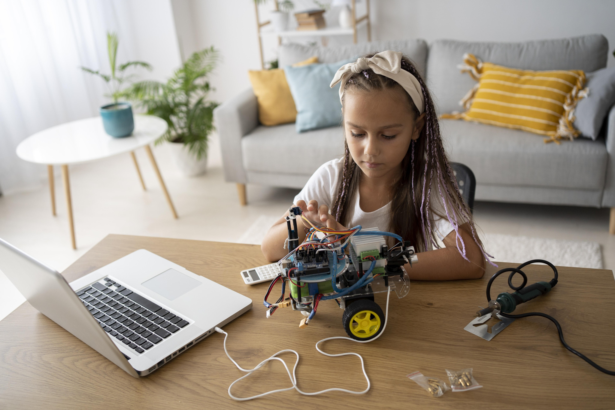 adorable-girl-being-passionate-about-robotics