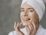 beautiful-woman-using-skin-care-cream