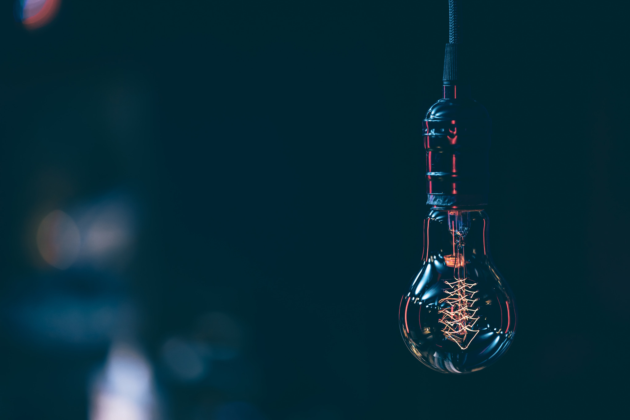 close-up-burning-lamp-dark-copy-space