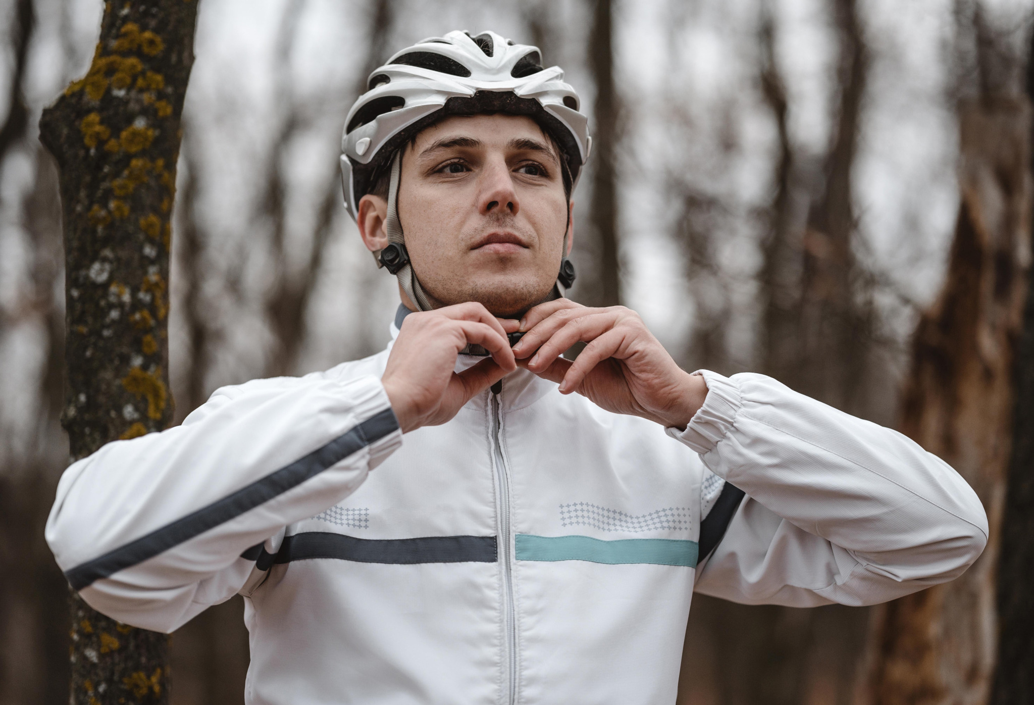 front-view-man-putting-safety-helmet-biking