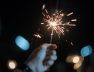 hand-holding-burning-sparkler-light