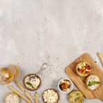 flat-lay-delicious-bread-with-tomatoes-chopper-with-copy-space